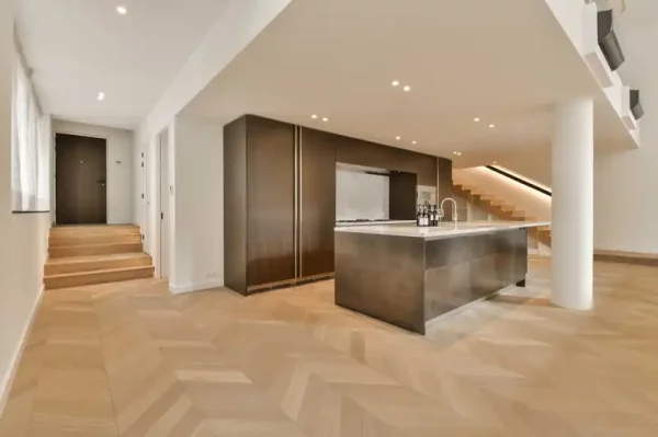 a-kitchen-with-wooden-floors-and-a-stainless-steel-2026-03-18-08-13-48-utc